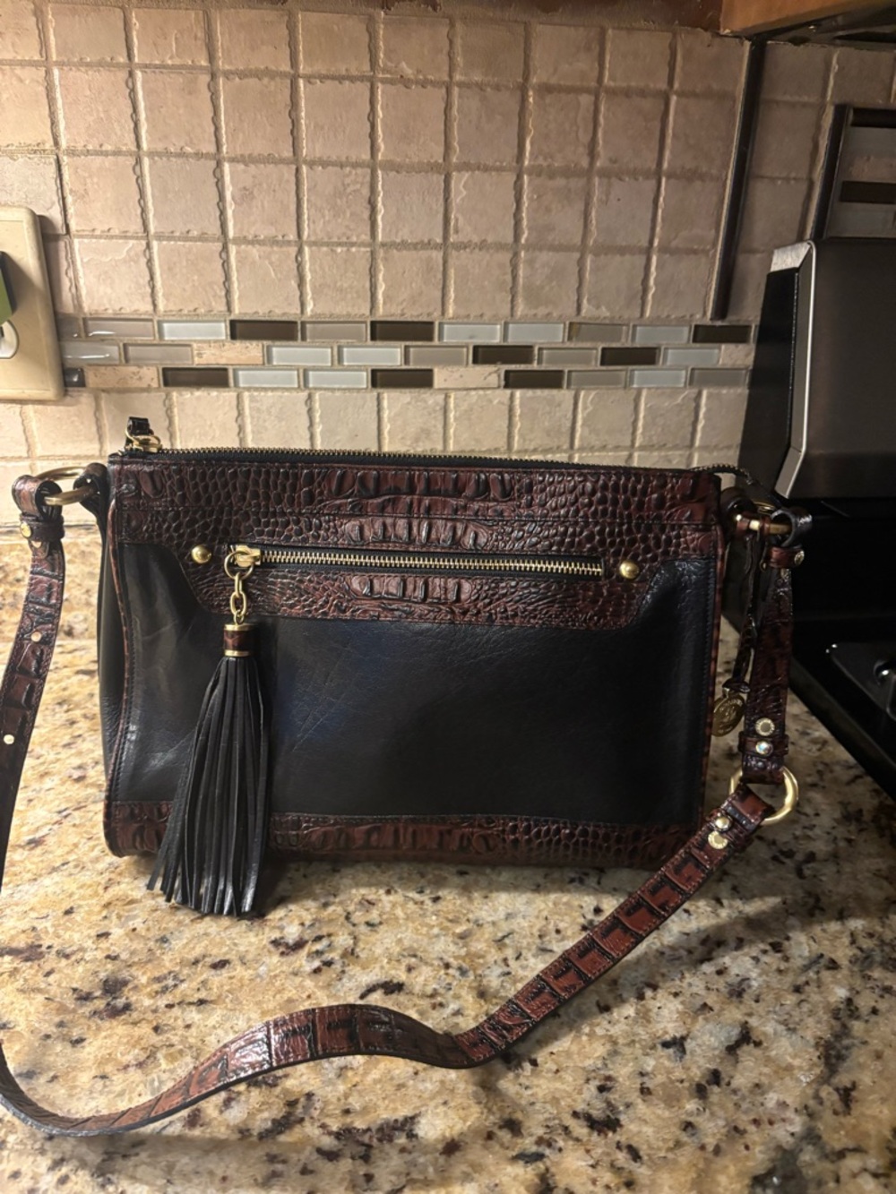 Brahmin Black and Brown Leather Crossbody with Tassel Accent